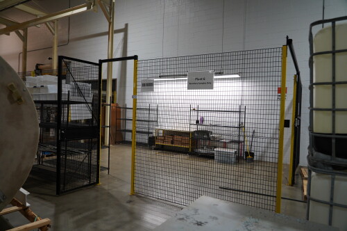 CONTAINMENT CAGE WITH CONTENTS ; (4) SECTIONS OF RACKING , ROLLING TABLE