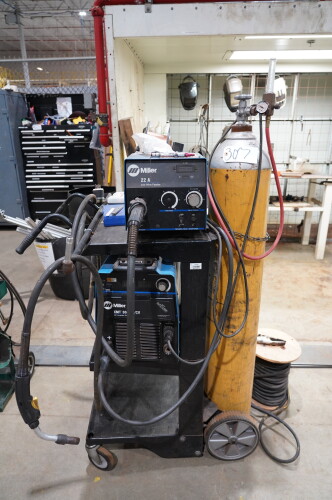 MILLER XMT304 CC/CV DC INVERTER ARC WELDER; INCLUDES 24V WIRE FEEDER, PROPANE TANK, SPOOL OF GROUNDING CABLE, MEG GUN, PORTABLE CART