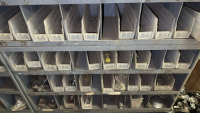 PART CABINET W/ BEARINGS, NUTS, BOLTS - 3