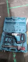 Makita 1-9/16 Rotary Hammer Drill Model: HR4002 with bits