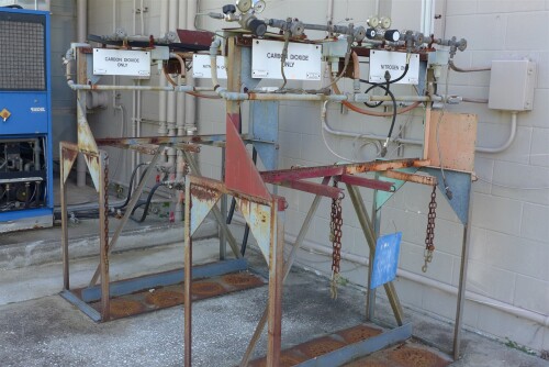 Lot of 4 Racks for Holding Gas Cylinders with Regulating Valves