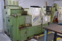 Okuma Cadet LNC8 CNC Lathe including Hennig 100105 Chip Conveyor