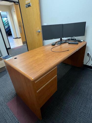 Office with Contents &ndash; (2) Samsung Monitors, Wooden Desk with Drawers, and Docking Station