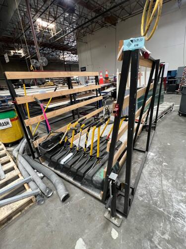 Rolling cart with broom bins