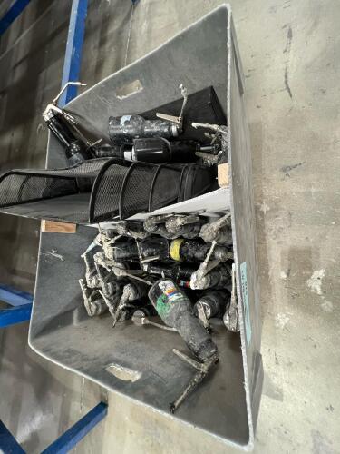 Bin of oil canisters