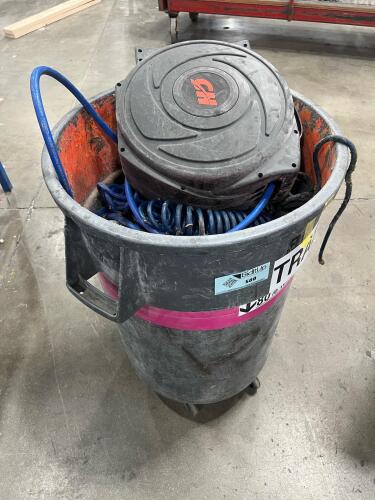 Hoses in industrial trash can