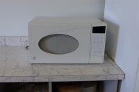Lot of 2 items including Refrigerator and Microwave Oven