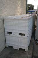 Plastic Stackable Crates with Contents of Crossby Duwar Tank Insulator Jackets