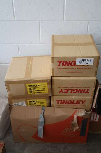 Boxes of Tingley Boot Saver XL Disposable Natural Rubber Shoe Covers