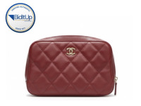 Chanel cosmetic case in red quilted leather