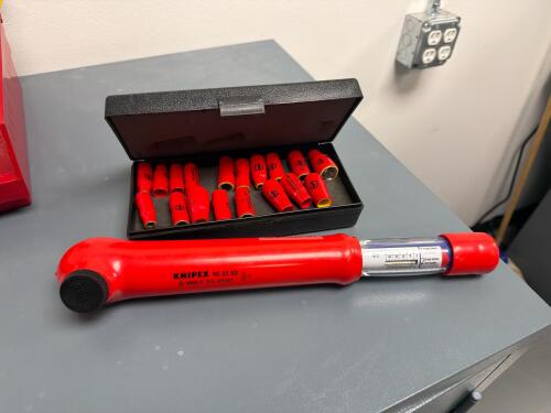 Knipex 98 33 50 insulated torque wrench and a set of insulated sockets. (Sockets do not fit this specific wrench)
